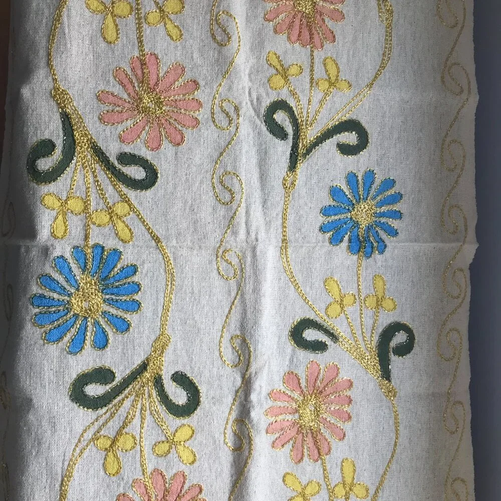 Decorative Turkish table runner with vibrant floral design.
